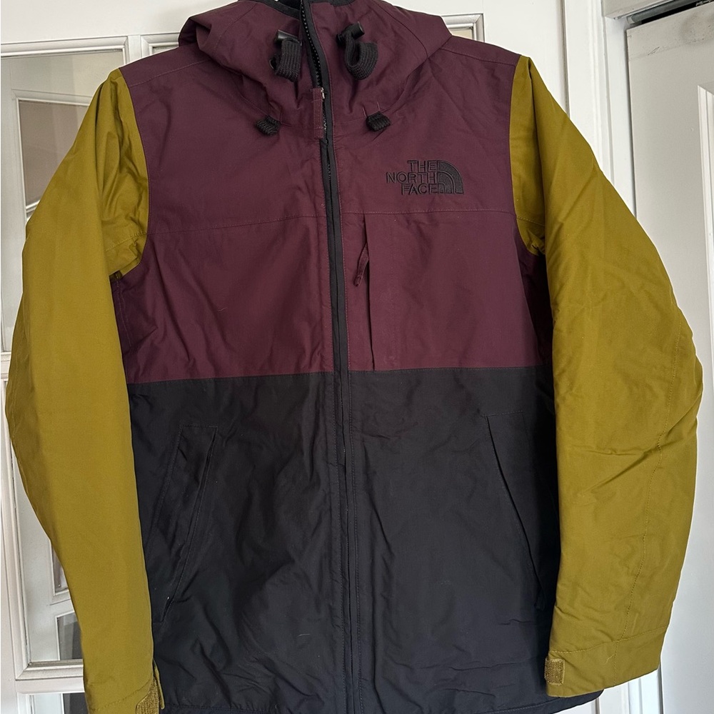 The North Face Purple and Black Ski Jacket for Winter Sports